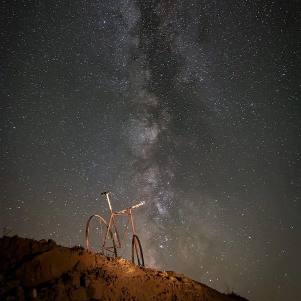 Vintage bicycle under dark sky in Monroyo Spain photo by Luis Pitarque
